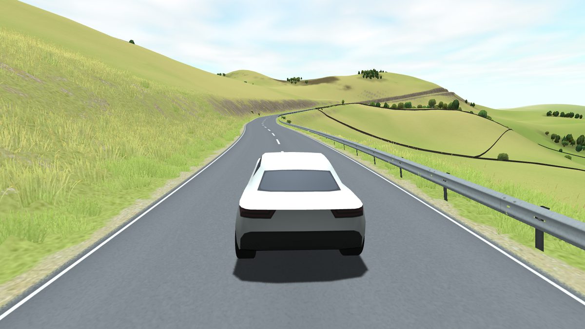 The white roadster on a two-lane road curving through green summer hills, seen from the chase camera